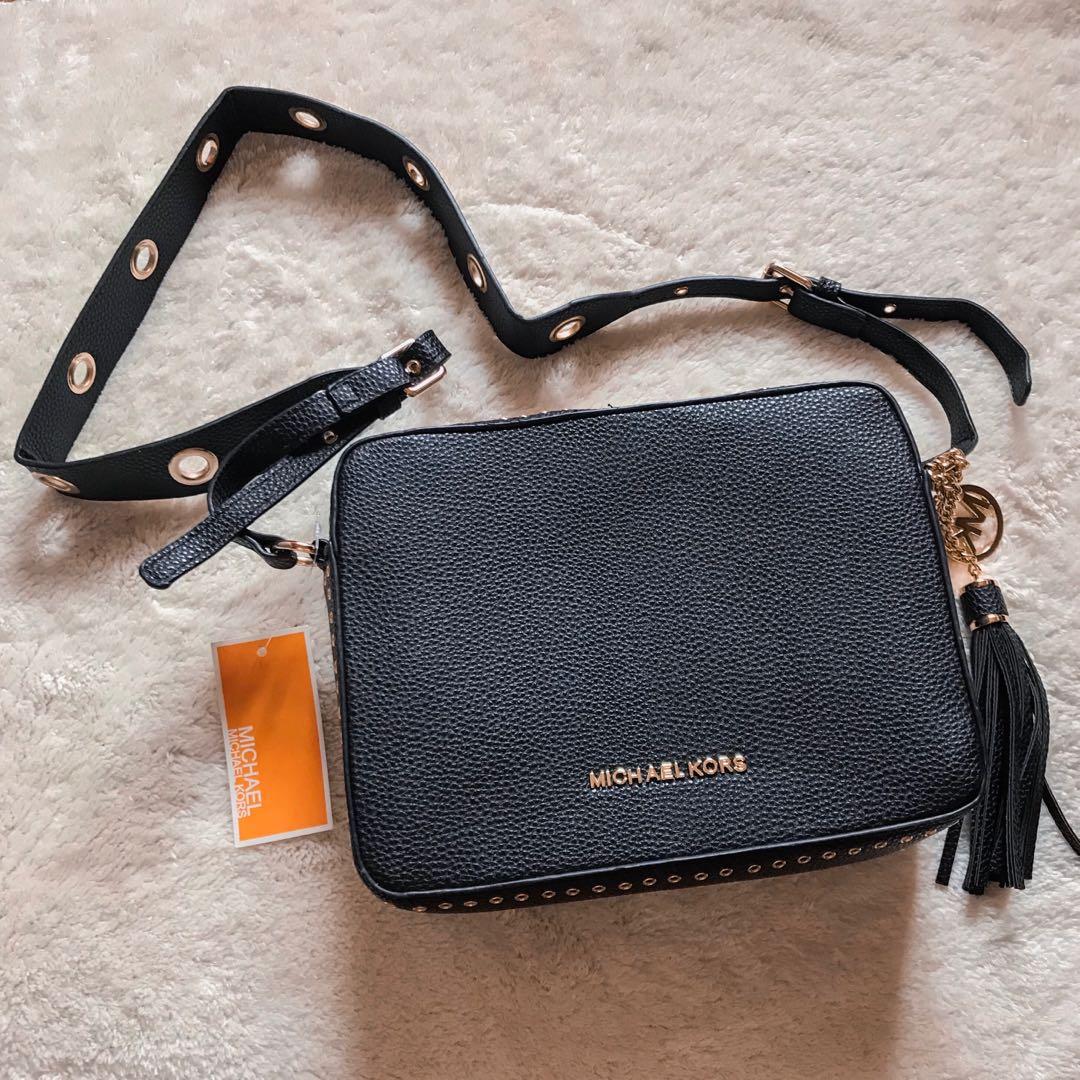 MK mini sling bag, Women's Fashion, Bags & Wallets, Cross-body Bags on  Carousell