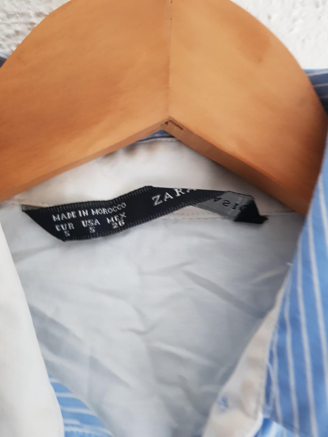 Zara button down polo (Category: Longsleeves) located in Quezon City. Submitted by letsraidclosets (Listing ID 271418697, Image 2). Description: In great condition. A bit of makeup stain on collar but not seen when worn.