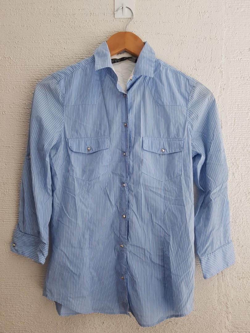 Zara button down polo (Category: Longsleeves) located in Quezon City. Submitted by letsraidclosets (Listing ID 271418697, Image 1). Description: In great condition. A bit of makeup stain on collar but not seen when worn.