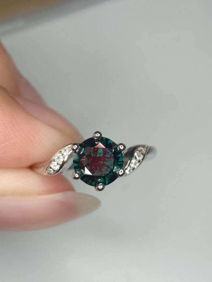 Dark green deals moissanite ring