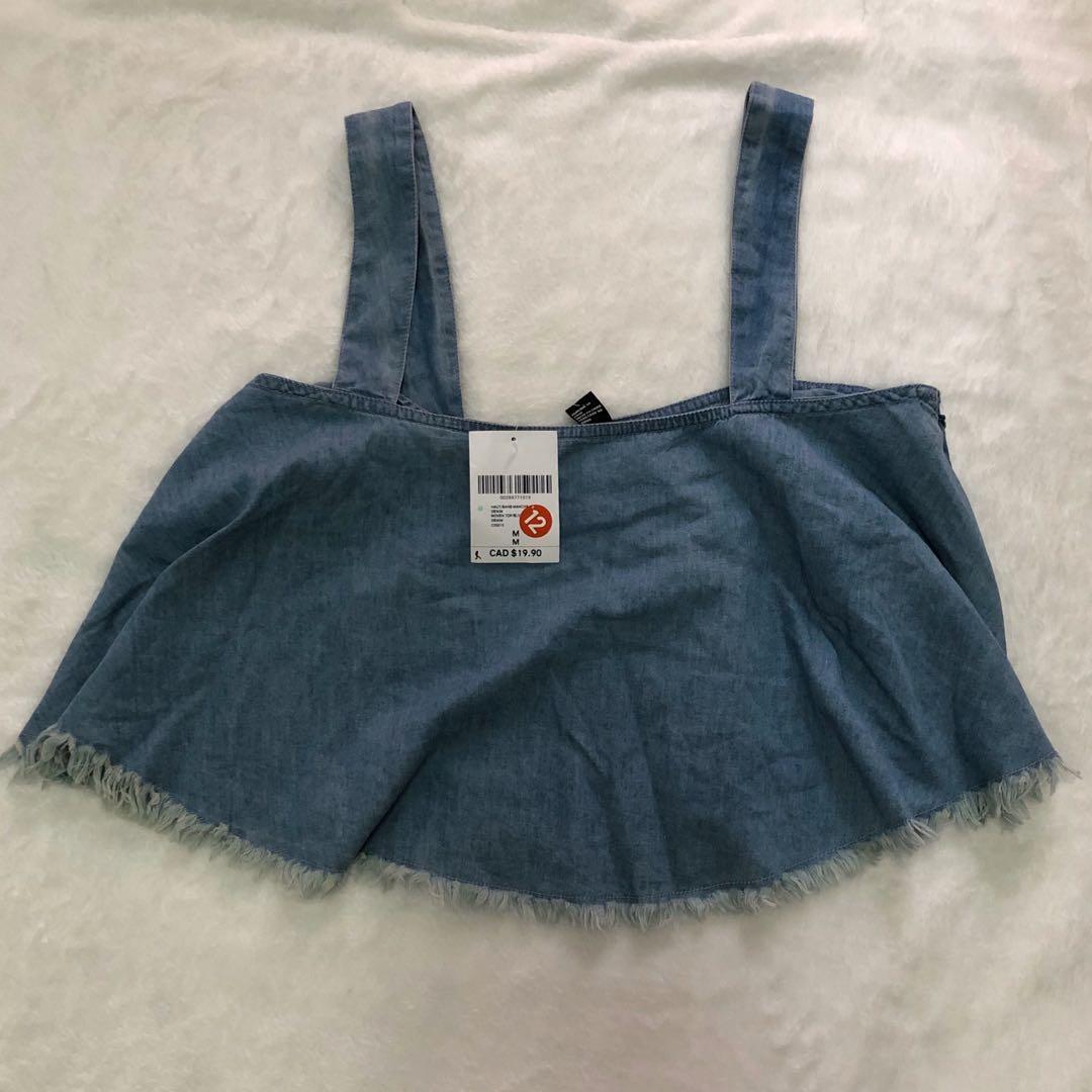 Forever21 denim sleeveless crop top (Category: Sleeveless) located in Manila. Submitted by jazzmayn (Listing ID 271495252, Image 1). Description: ✨ Brand new, still with tag ✨ Bought in Canada ✨ 💯 Authentic ✨ Fits M-L ✨ Last Price: P200.