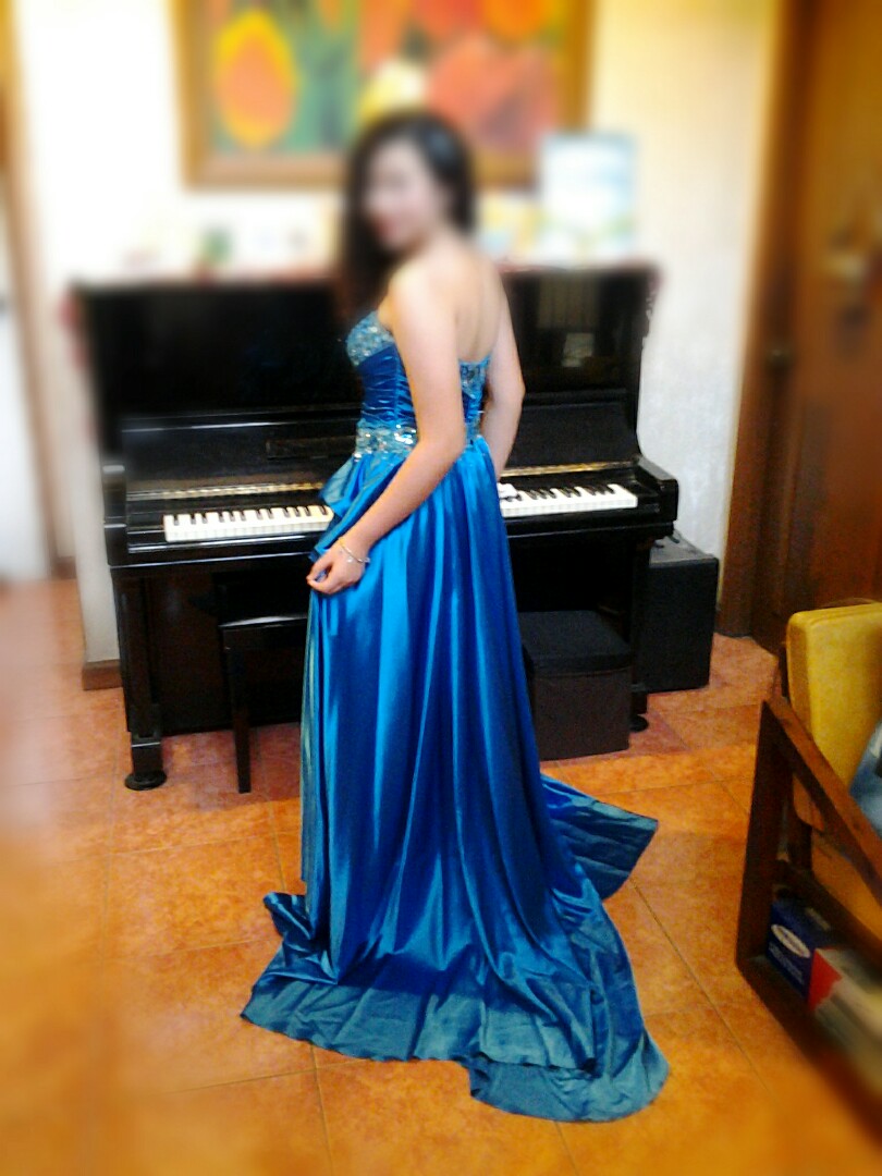 Blue Long Gown with Removable Trail/Skirt (Category: Evening dresses & gowns) located in Las Pinas. Submitted by tsuki25 (Listing ID 271729989, Image 2). Description: Used only once for my HS Grad Ball. Had it tailored so it's one of a kind. The trail/skirt is removable to have 2 different looks: the first look is the first photo, and the other is the short dress underneath whose skirt is made up of lovely soft black synthetic feathers as seen in