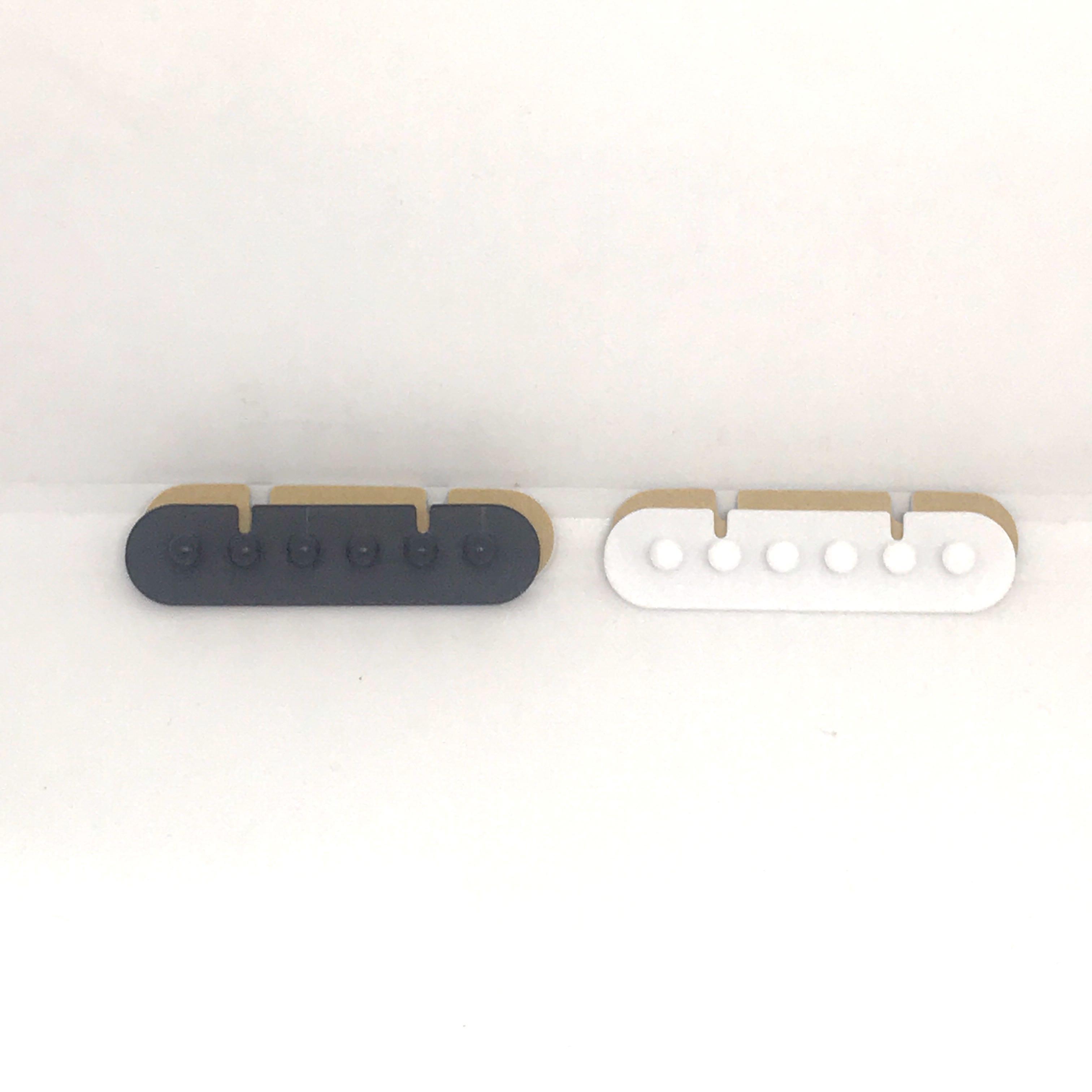 Cables and charger organizer plug holder (Category: Storage Boxes & Baskets) located in Manila. Submitted by hodlclub (Listing ID 262245139, Image 3). Description: 50 php each Just stick at the back. Ready to stick on your wall or desk Available in black or white .