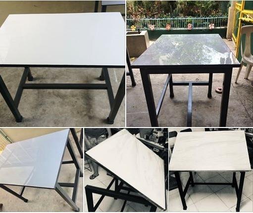 Drafting Table (Category: Tables & Sets) located in Pasig City. Submitted by draftingtablemaker (Listing ID 271722946, Image 1). Description: Fixed 60x90cm Main Table. -table with stable adjustable height drawing surface for home, dorm or classroom with limited space. • with German made mechanism to tilt. Multi-Function- A key feature found in drafting tables is the ability to adjust the board from flat surface upto 60 degrees inclined angle or t