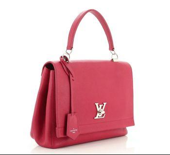 Louis Vuitton Lock Me II Handbag Leather