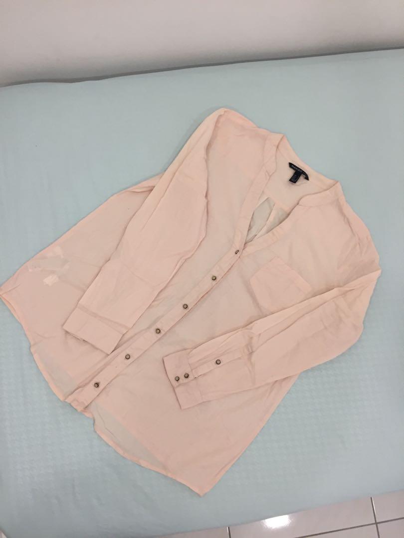 MANGO basic peach top (Category: Blouses) located in Bangi. Submitted by nunani (Listing ID 271850170, Image 1). Description: Comfy top Condition 6/10 Not for a fussy buyer .