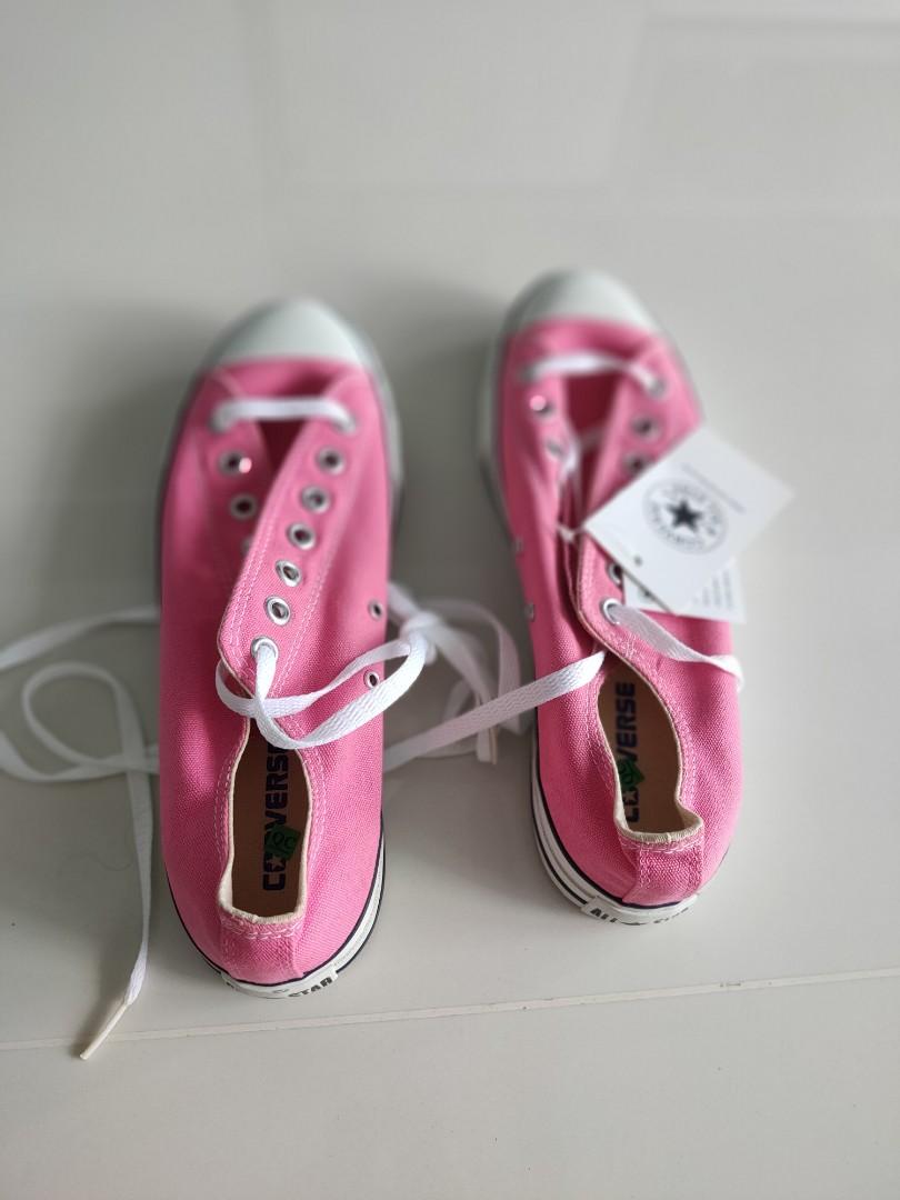 grey and pink ladies converse