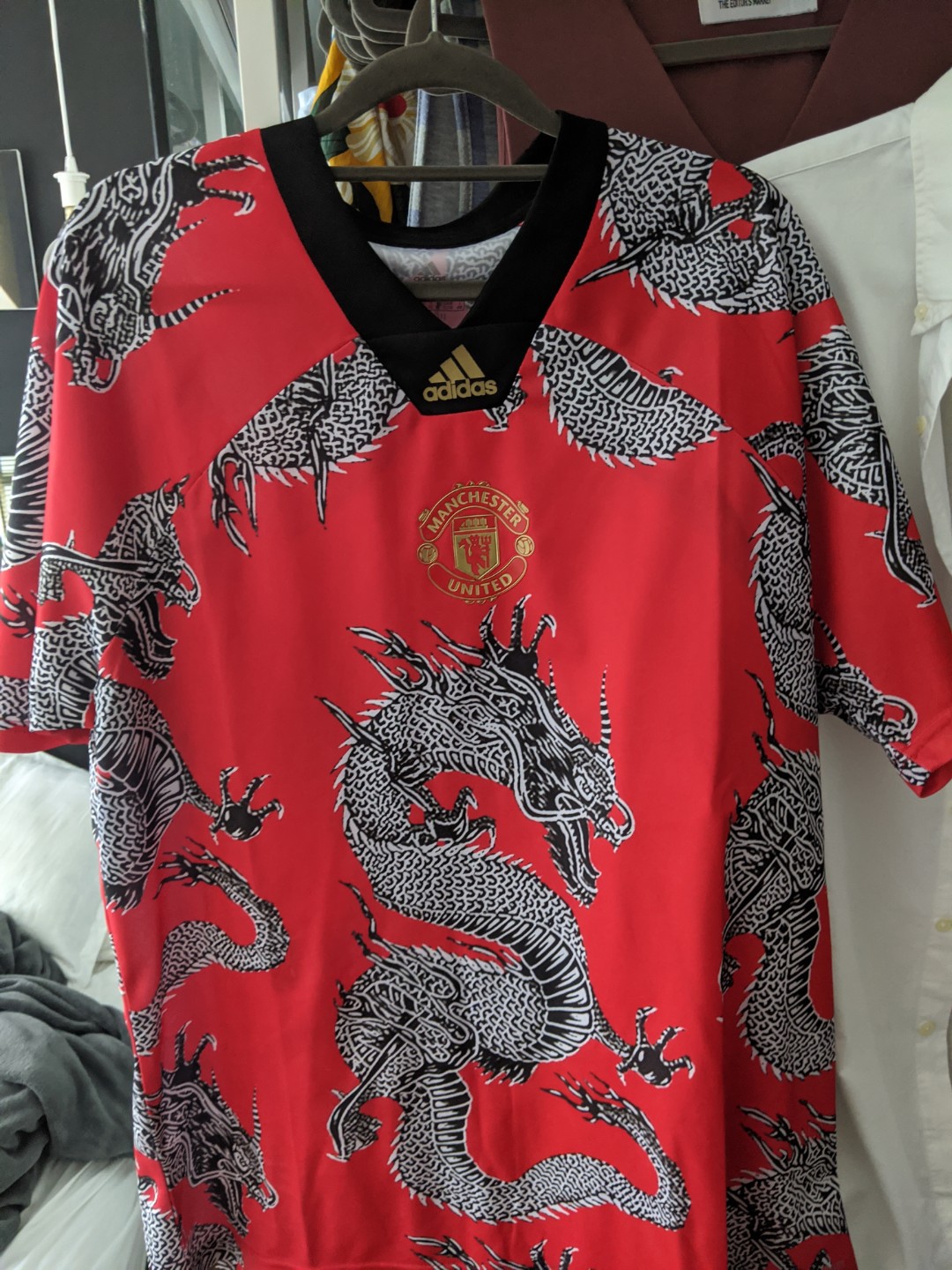 Man u dragon best sale shirt