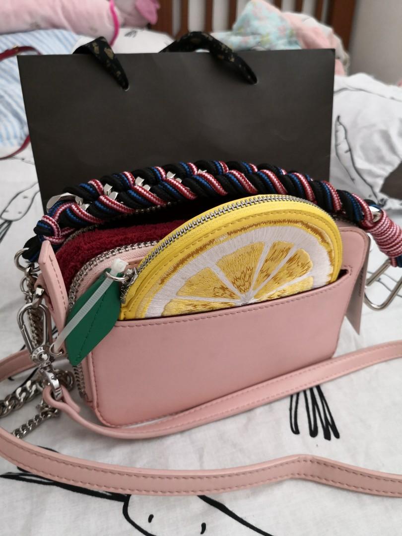 Used Charles Keith lemon pouch sling bag