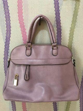 Tas wanita ungu muda