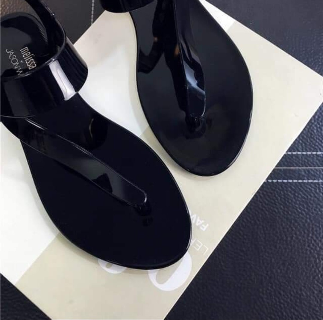 black jelly flip flops