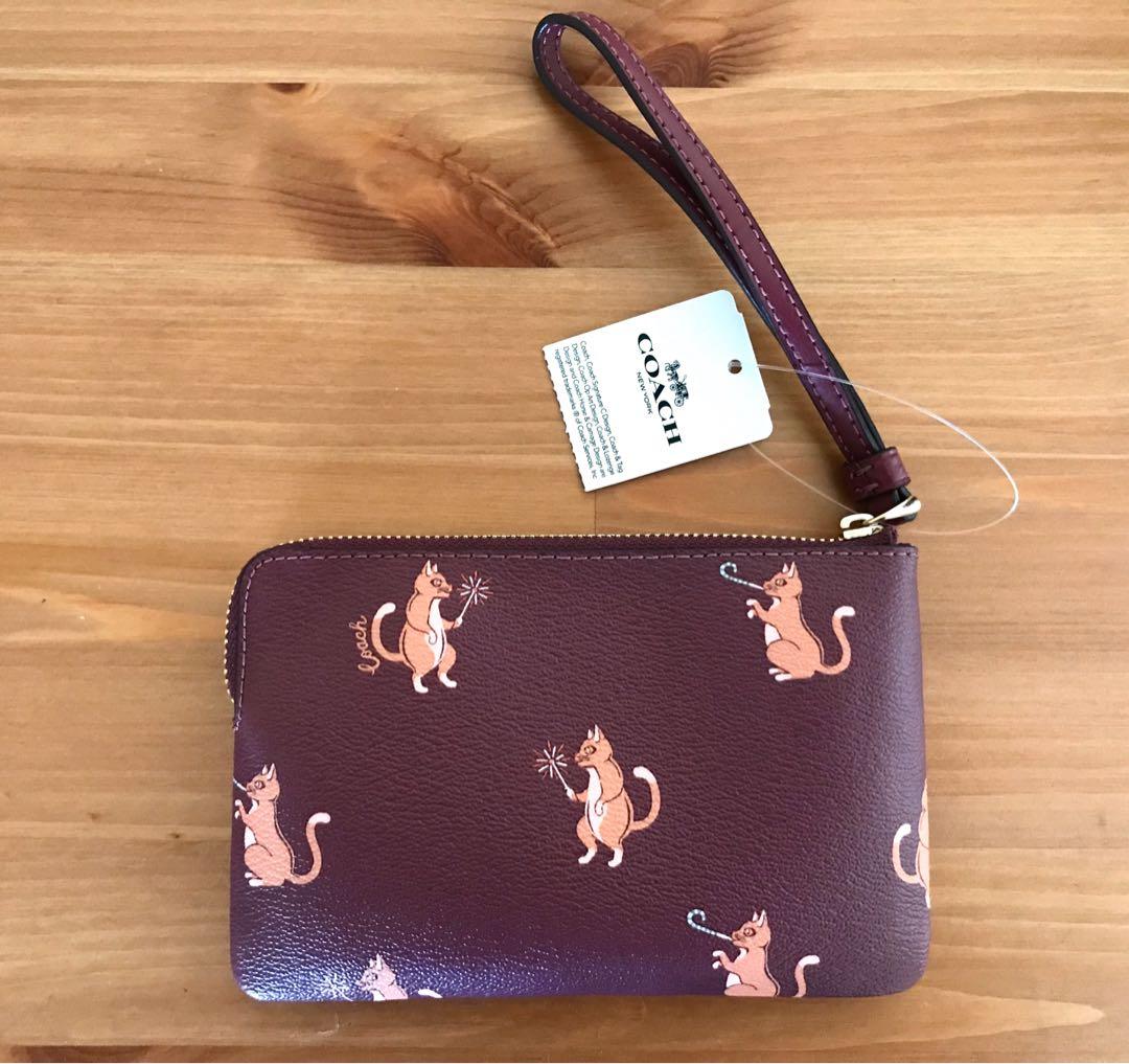 coach cat purse