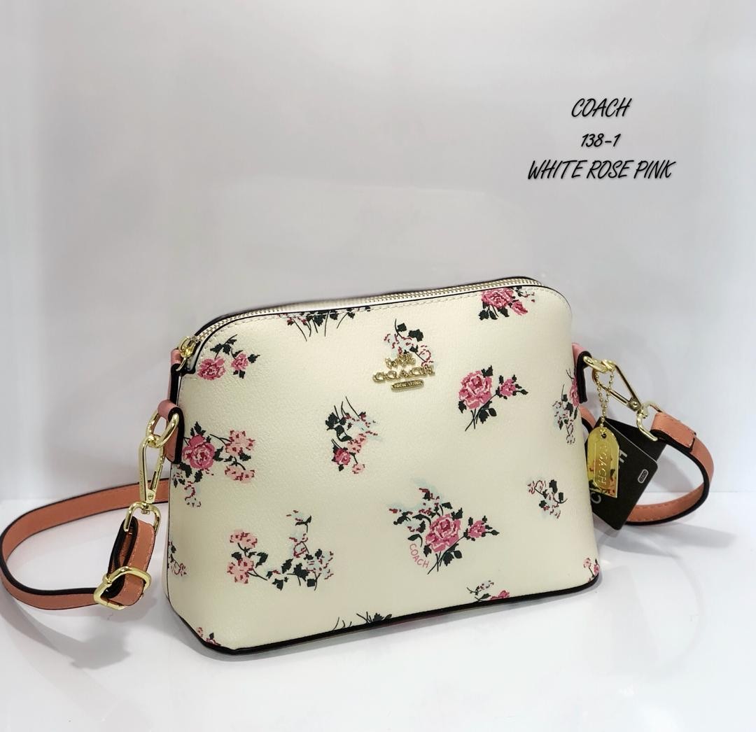 coach floral clutch