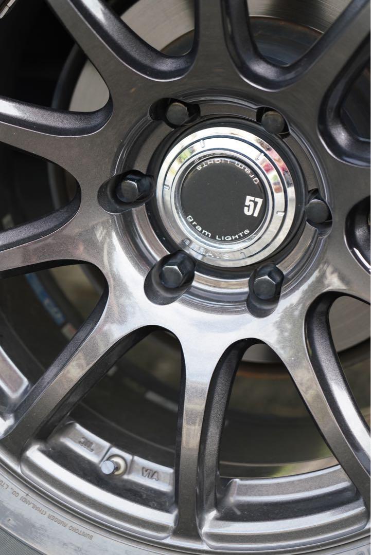 Original Rays Gram lights 57 Trans X 18x8 plus 20 offset 6h x 139.7 pcd super dark gunmetal rims