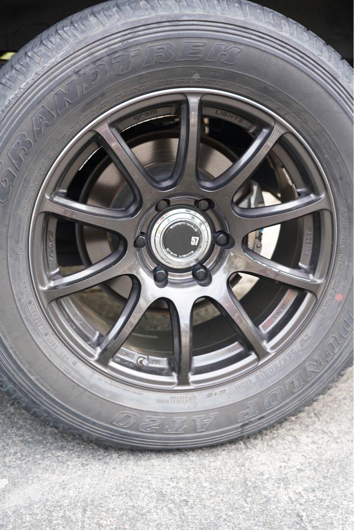 Original Rays Gram lights 57 Trans X 18x8 plus 20 offset 6h x 139.7 pcd super dark gunmetal rims