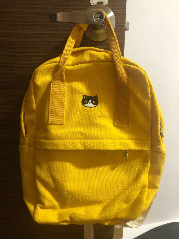 yellow cat backpack