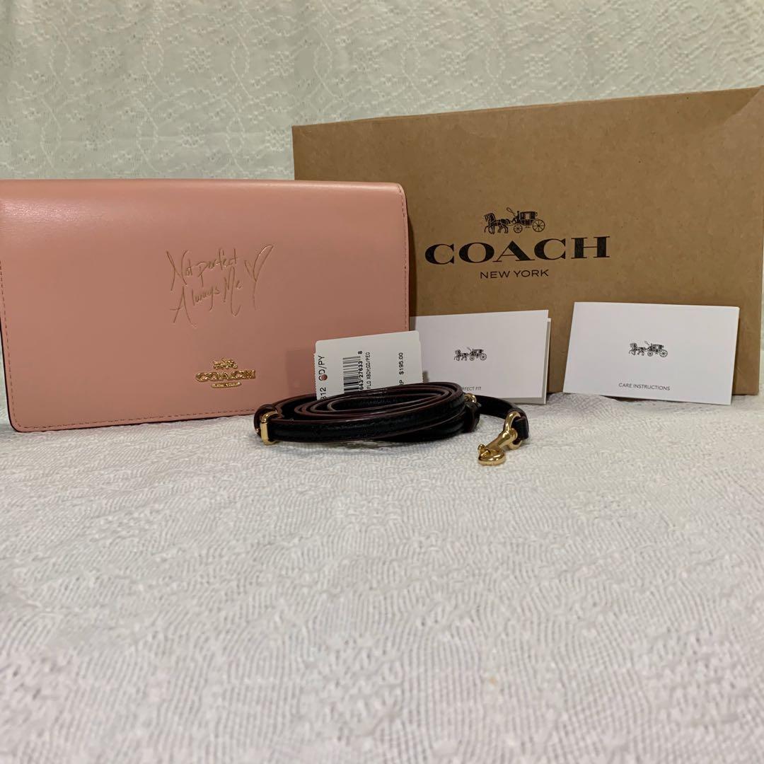 Coach Cross Body Clutch Bag (Category: Luxury Bags & Wallets) located in Marikina City. Submitted by zevenoutlet (Listing ID 272566432, Image 1). Description: ⚜️Coach Cross Body Clutch Bag ⚜️Coach x Selena Gomez Collection — “Not Perfect Always Me” ⚜️Material: Calf leather ⚜️Measurement: 4.8” H x 8” Width x 1.5” D ⚜️Removable and adjustable strap with 23” drop ⚜️Color: Light pink and maroon ⚜️Flap top with metal logo ⚜️Snap closure ⚜️One (1) bill