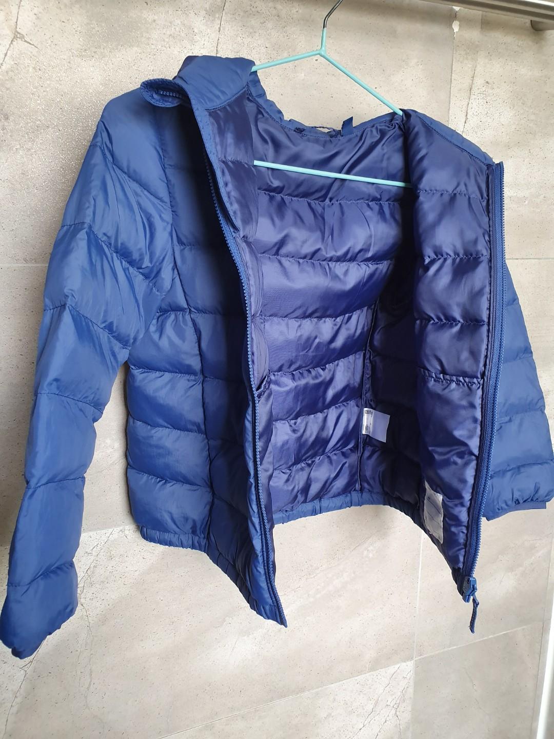 Jacket (Category: Coats, Jackets and Outerwear) located in Singapore. Submitted by handeric (Listing ID 272645216, Image 3). Description: Used winter jacket from Uniqlo. Size 120. Still very clean and in good condition, worn once to Japan. Cash only..