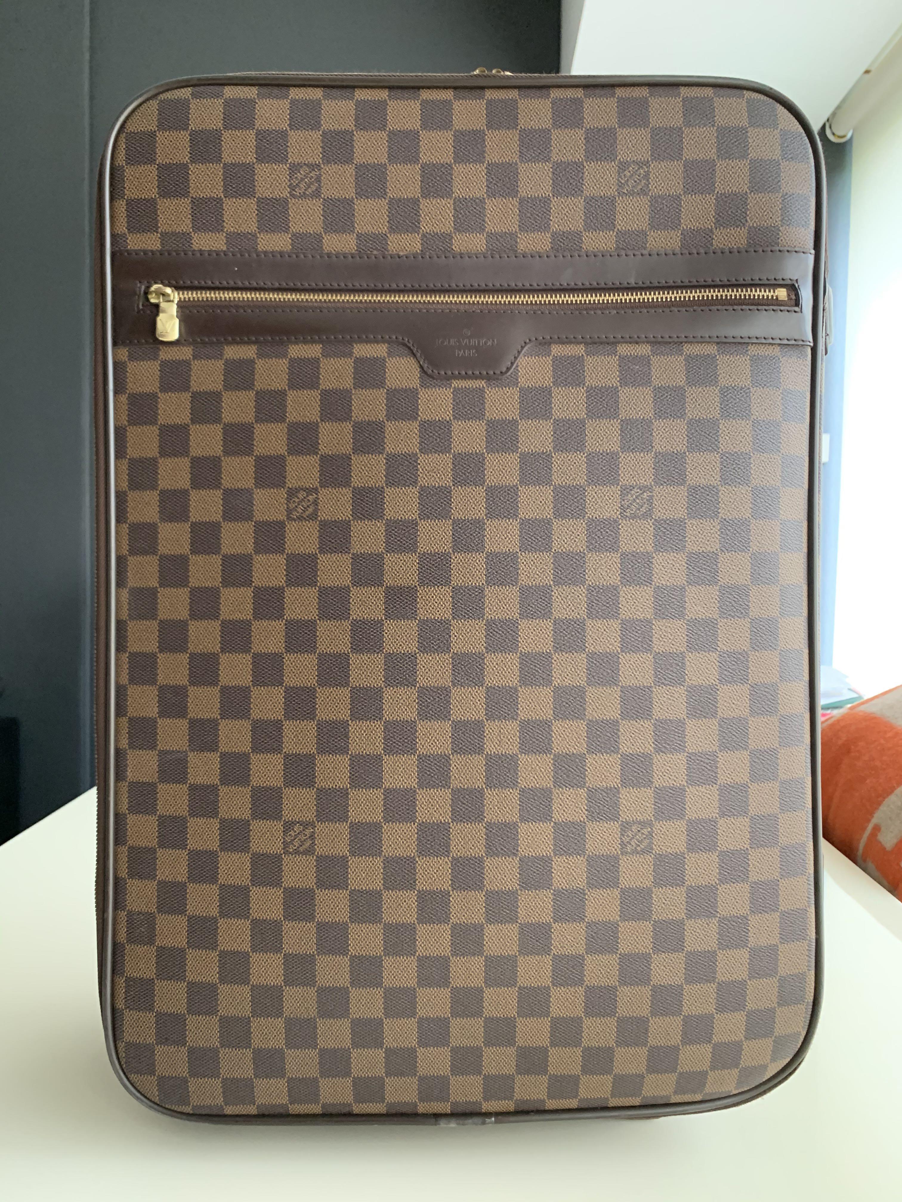 louis vuitton luggage wheel repair