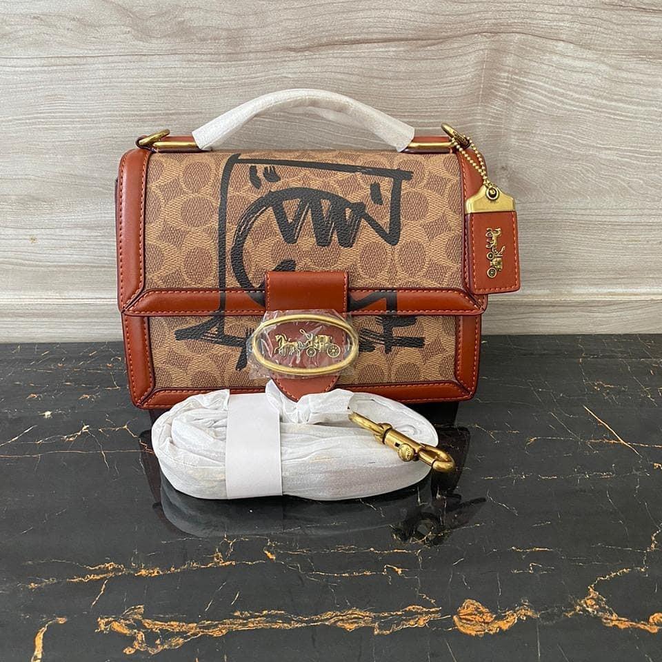 Coach riley top handle 18 in signature canvas clearance