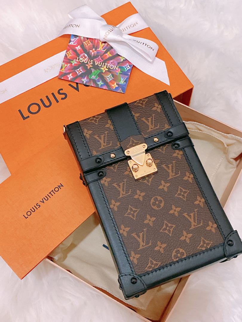 Shop Louis Vuitton Vertical trunk pochette (M67872, M67871) by lifeisfun