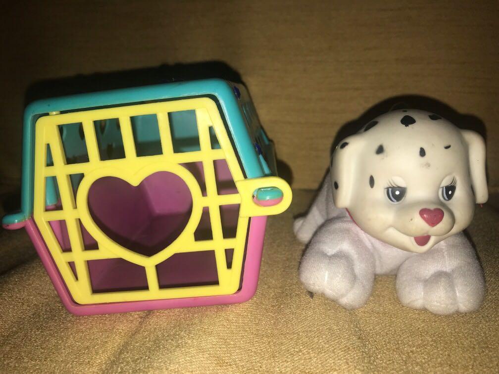 puppy in a cage toy