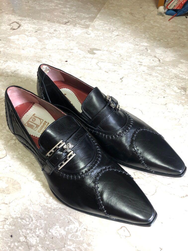 branded black leather shoes