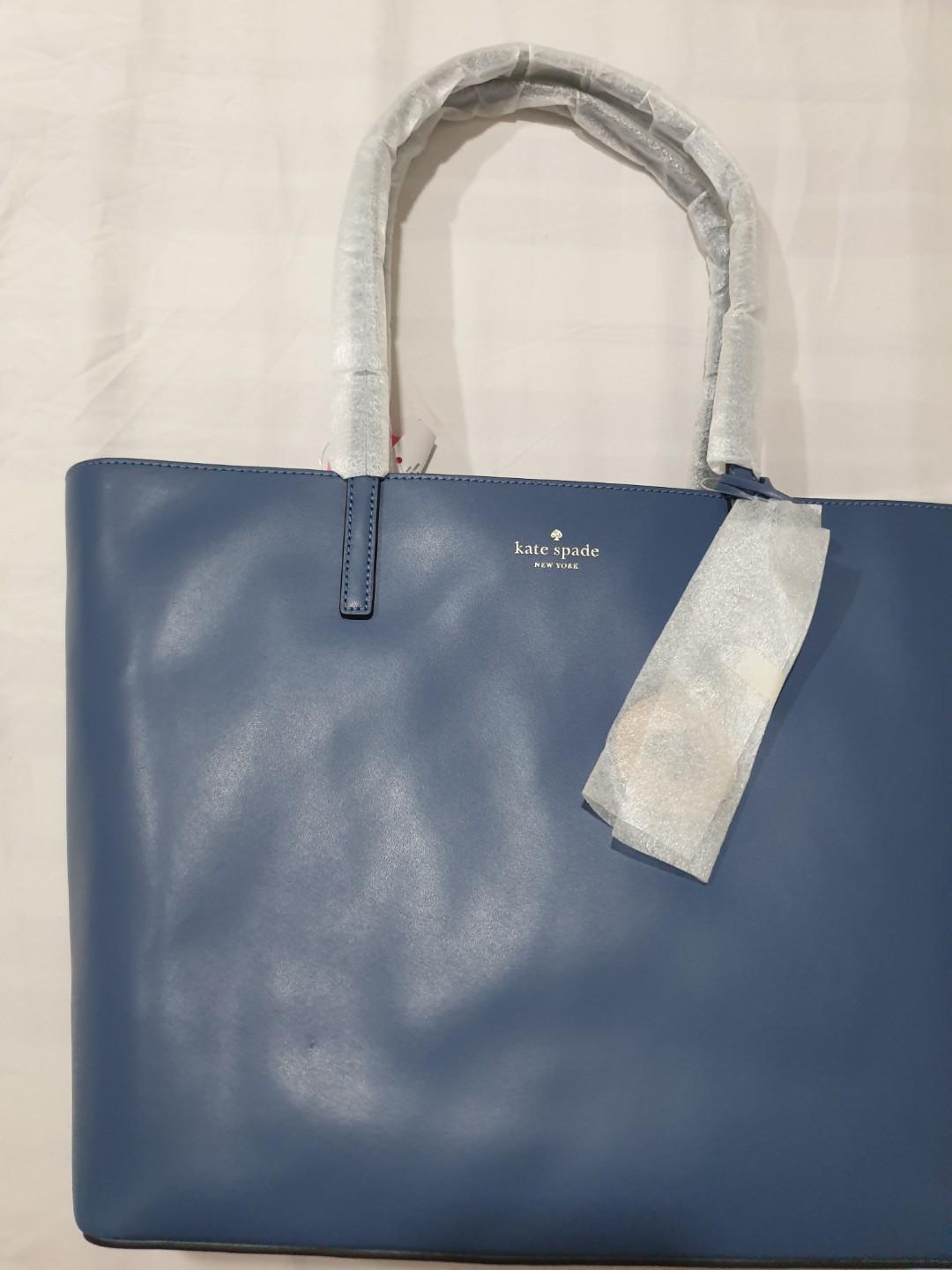 Repriced! Kate Spade Tote Bag (Category: Tote Bags) located in Pasig City. Submitted by rokels_locker (Listing ID 272937198, Image 3). Description: Kate Spade Tanya Medium tote Zipper closure one zipper pocket, two slip pockets smooth leather exterior; two way spade jacquard lining foil embossed logo SIZE: 12"h x 13.2"w x 5.3"d; drop length: 9".