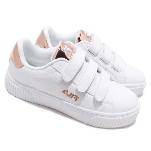 white and gold fila shoes
