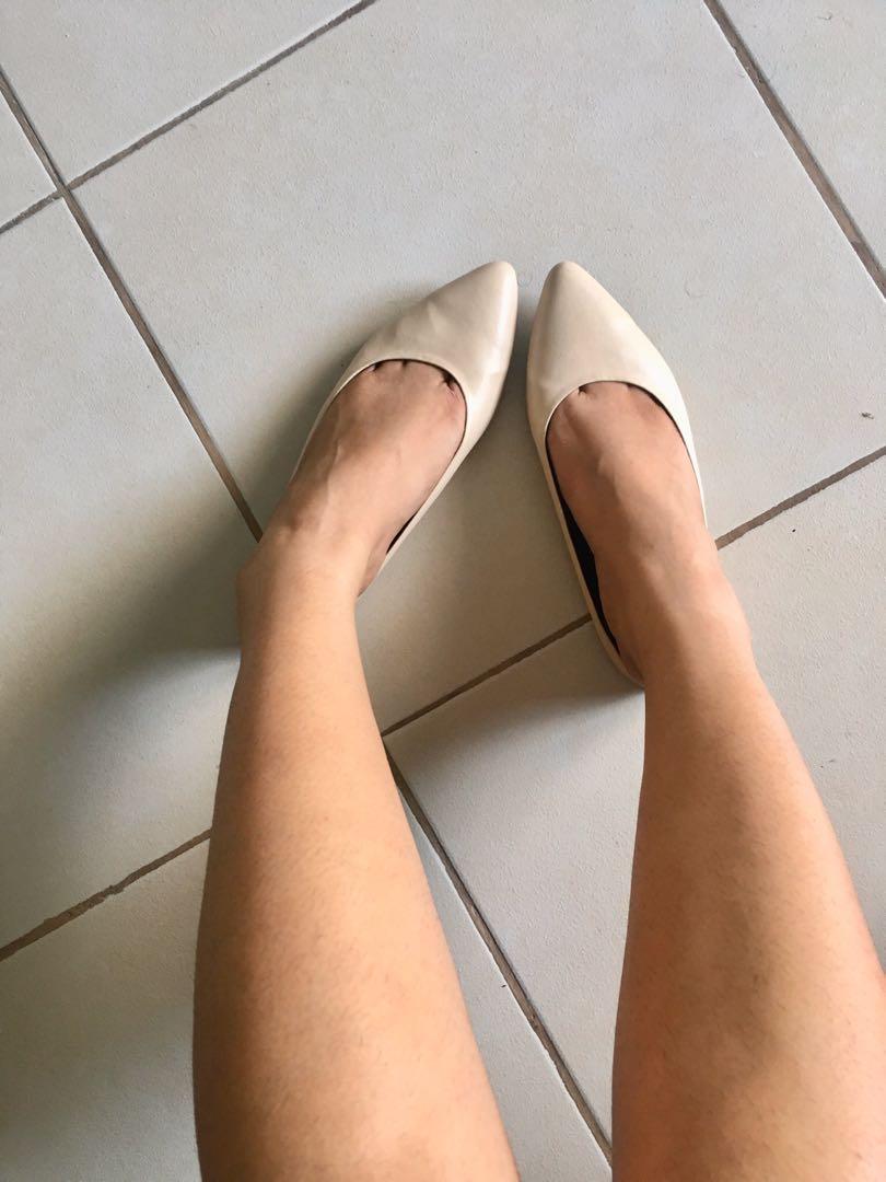 nude pink flat shoes
