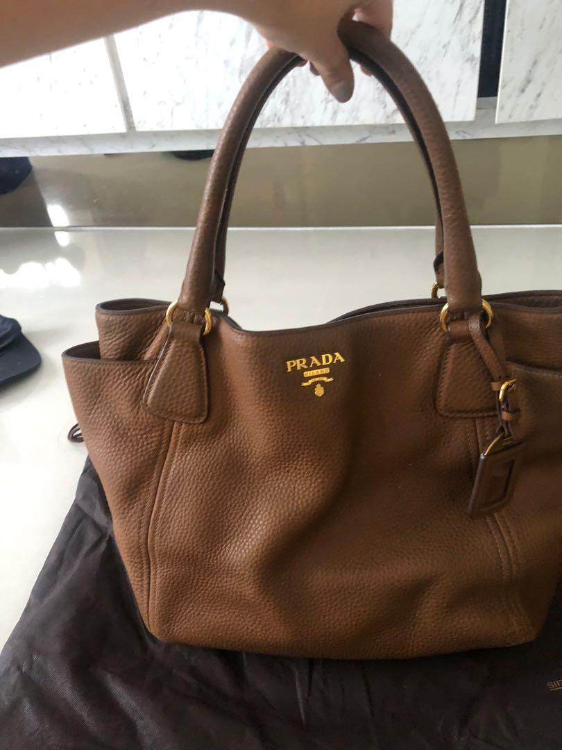 Prada camel color handbag, Women's Fashion, Bags & Wallets, Cross-body Bags  on Carousell