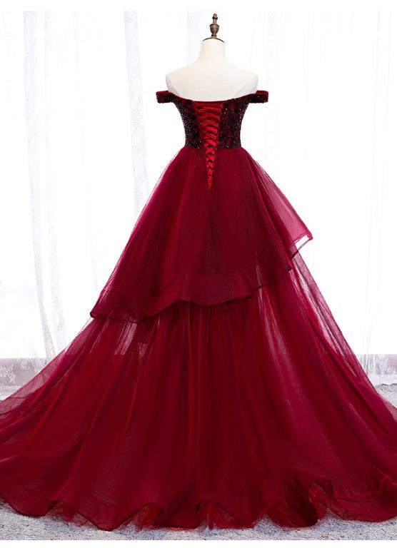 red ruffle gown
