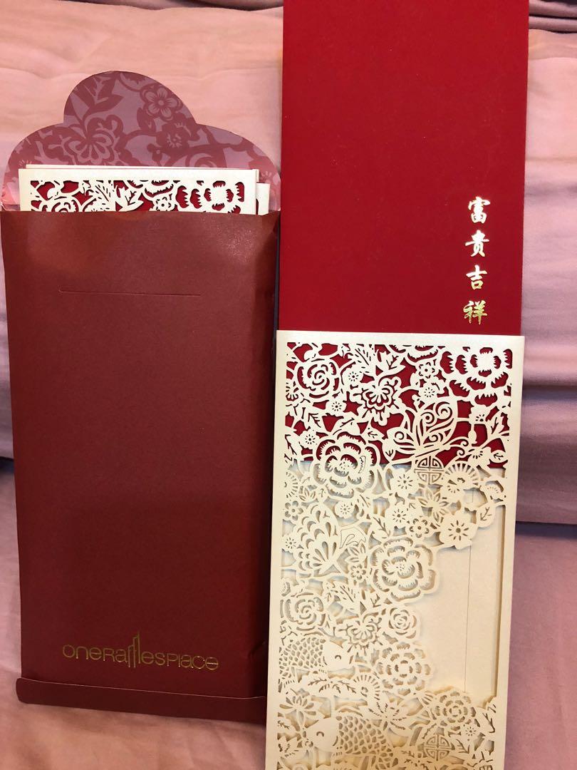 Red Packets (Category: Occasions & Party Supplies) located in Singapore. Submitted by erniegrace (Listing ID 273207631, Image 2). Description: Ang pow packets (8pieces) with intricate design from One Raffles Place. Ideal for new year and weddings..