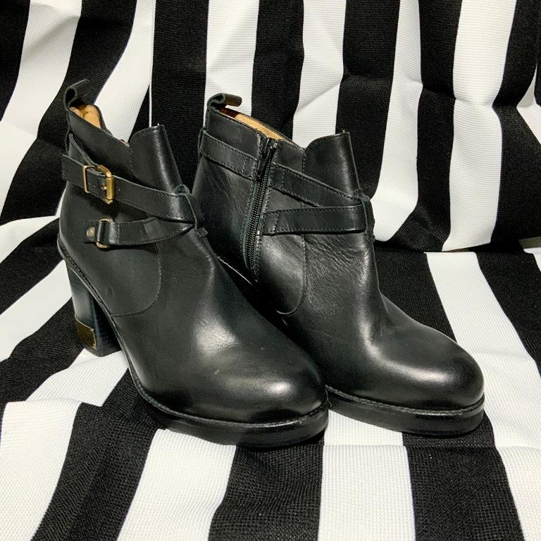 black boots with gold hardware