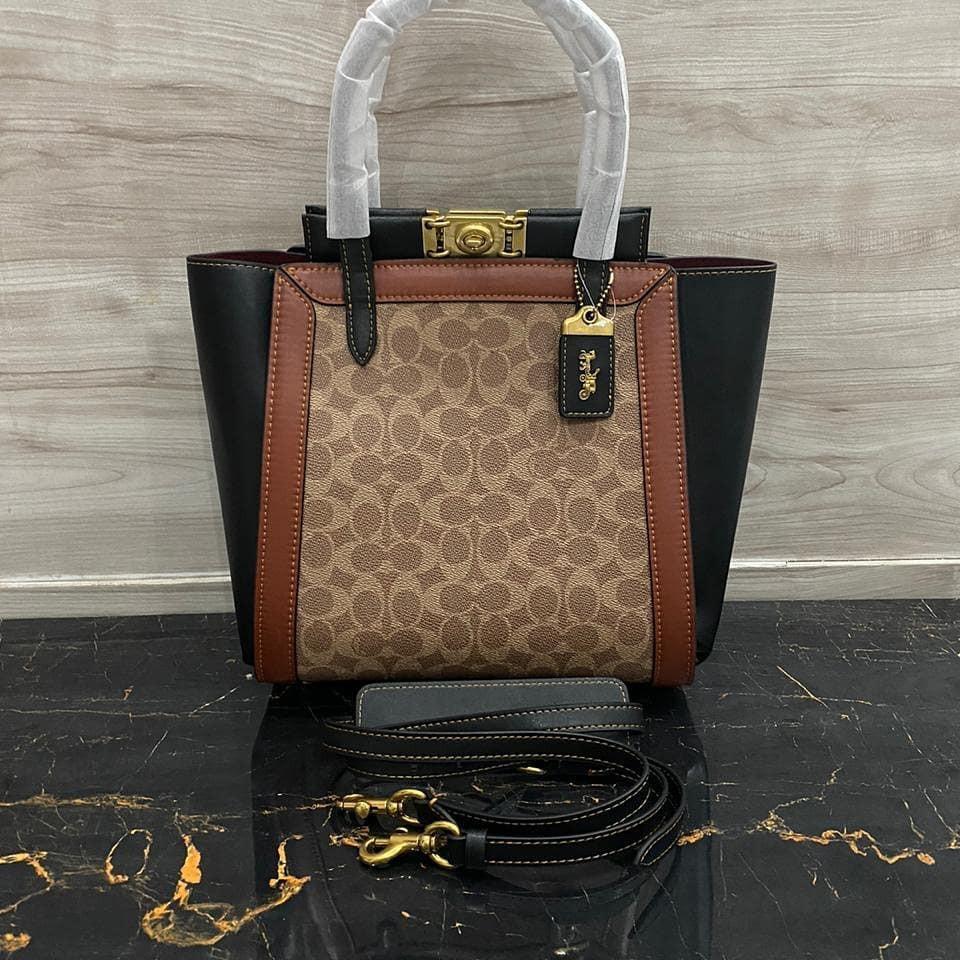 Coach troupe signature best sale