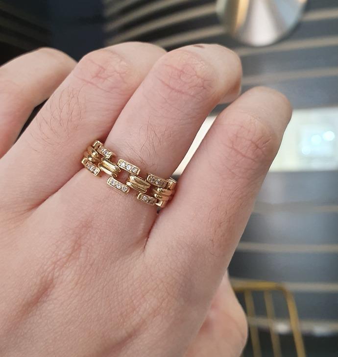 Gold ring with outlet chain