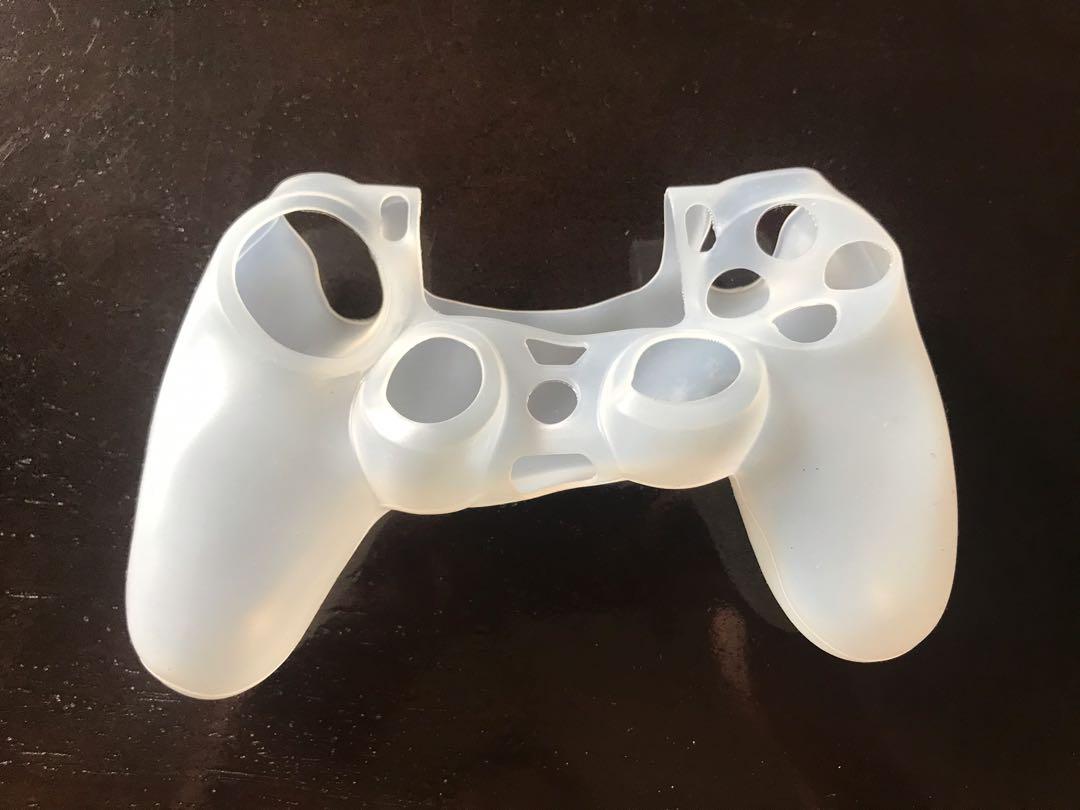 PS4 Dualshock Silicone Skins (Category: Controllers) located in Taguig. Submitted by ddalgination (Listing ID 273272832, Image 2). Description: PS4 Dualshock Silicone Skins in Black and White Comes in a pair RFS: Extra Pair PRICE NEGOTIABLE.