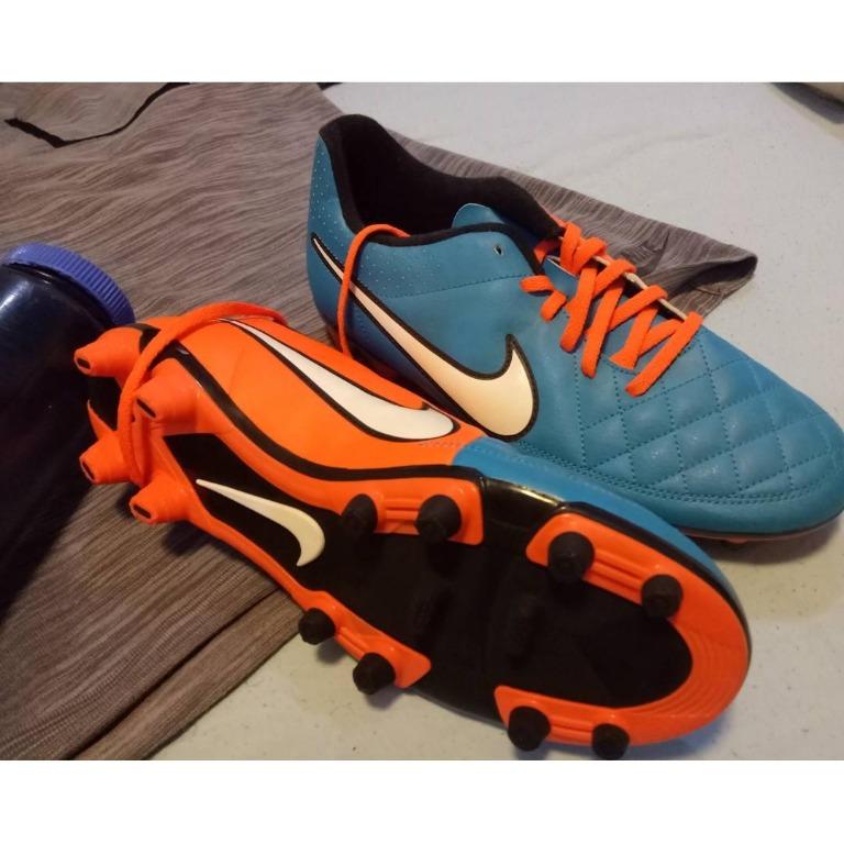 orange and blue football cleats