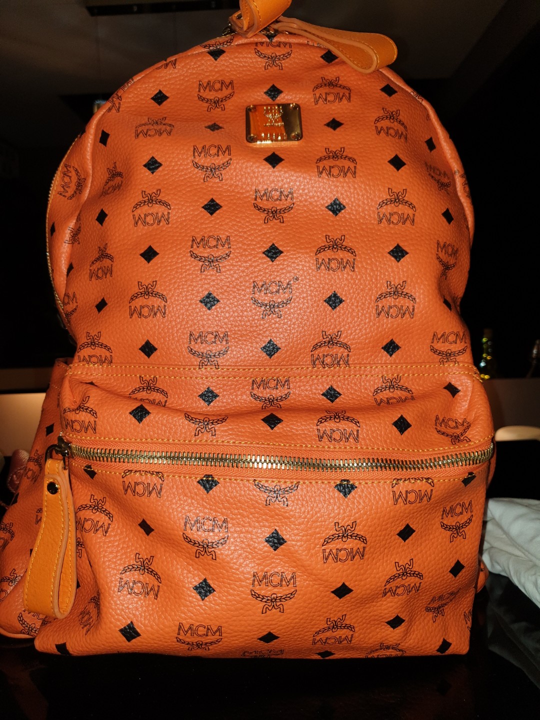 Orange mcm backpack outlet