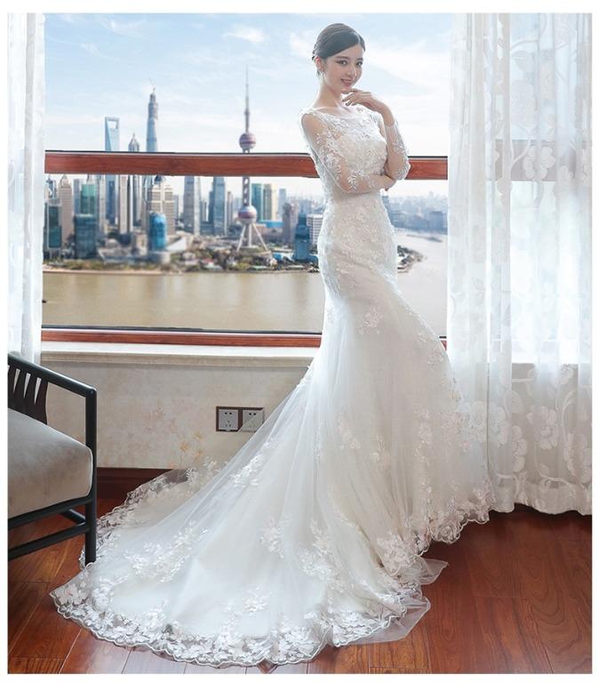 White long sleeve mermaid top wedding dress