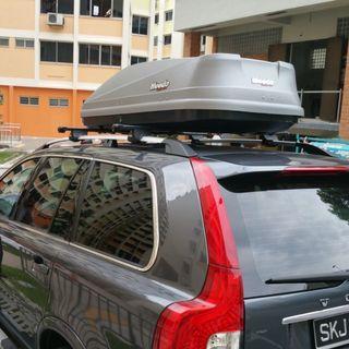 Car roof rack and box for rental.