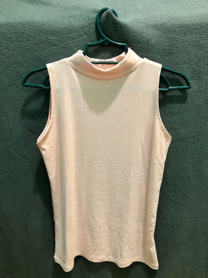 Sleeveless Turtleneck Top (Category: Sleeveless) located in Manila. Submitted by dclutterrr (Listing ID 273825596, Image 2). Description: .