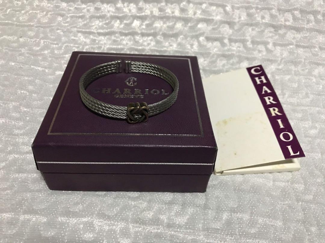 Authentic Charriol Heart to Heart Cuff (Category: Luxury Accessories) located in Quezon City. Submitted by closet_access (Listing ID 274063615, Image 2). Description: Personally bought at Charriol Podium and guaranteed authentic. 👍🏻 Comes complete with cards, box and paper bag. Will fit small to semi-medium wrists. The bracelet is designed in Charriol's signature stainless steel cable, accented with interlocking hearts that are gold-plated. Thi