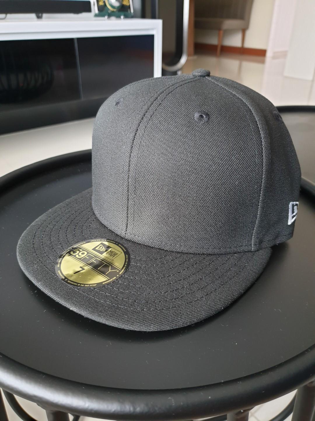 black fitted cap