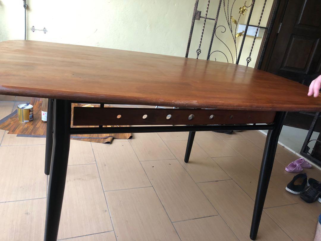 Dining table (Category: Chairs) located in Kuang. Submitted by mona123 (Listing ID 274356192, Image 3). Description: Solid wood. The metal part is painted and anti rust was sprayed before hand.. only small defect on the corner.