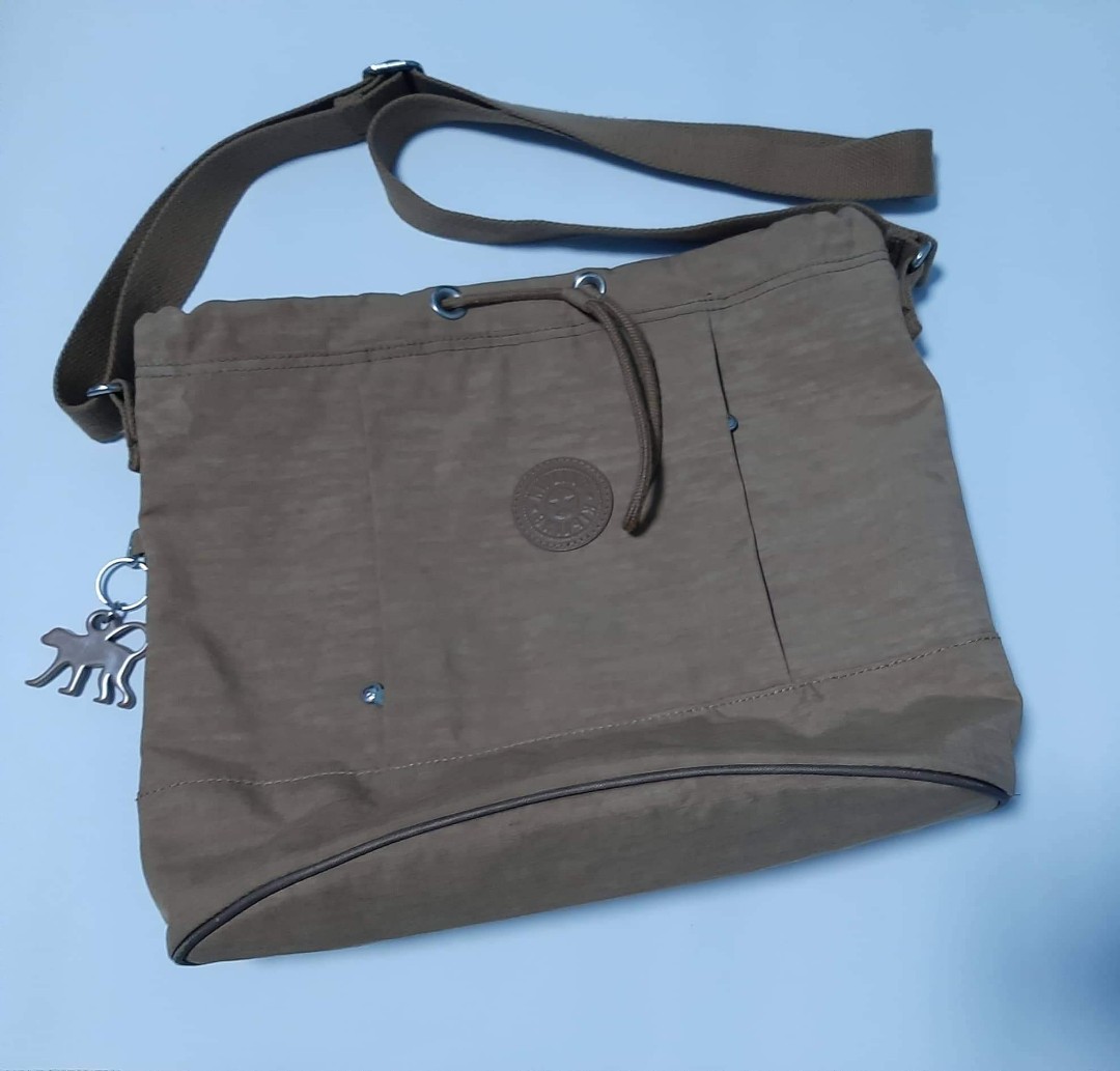 kipling sling bag original vs fake