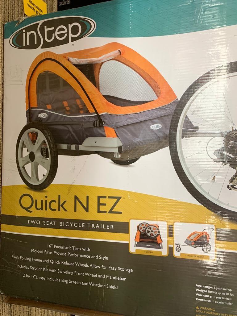 instep bike trailer age limits