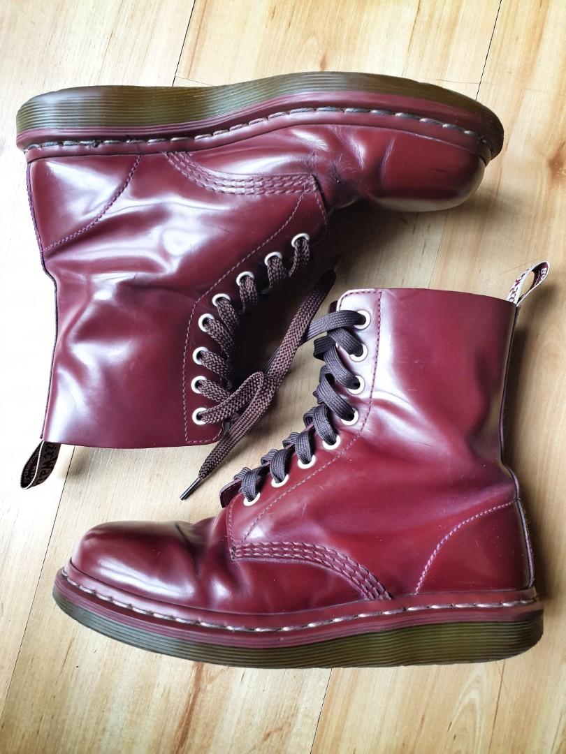 cherry red dr martens with black polish 