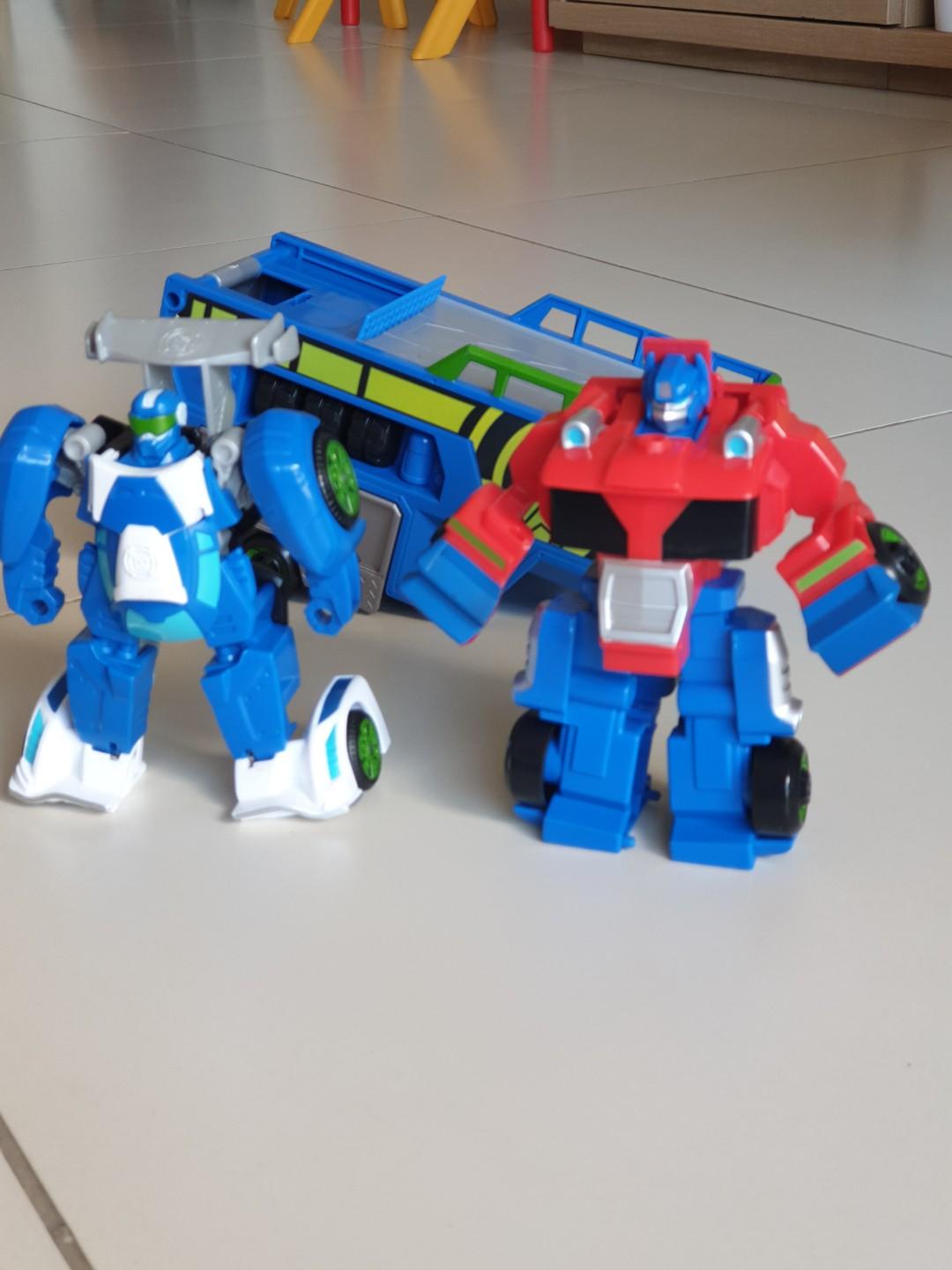 playskool heroes transformers rescue bots optimus prime racing trailer