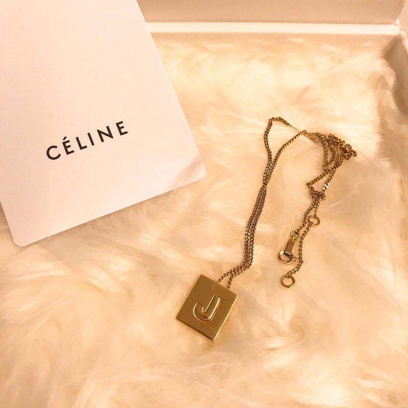 Selfridges letter necklace top